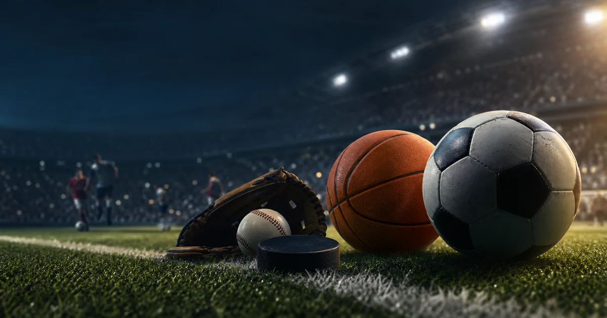 A set of unbranded sports equipment under stadium lights