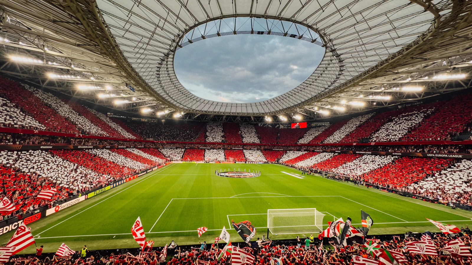 Supporters create a red-and-white stadium display at San Mames in Bilbao, Spain